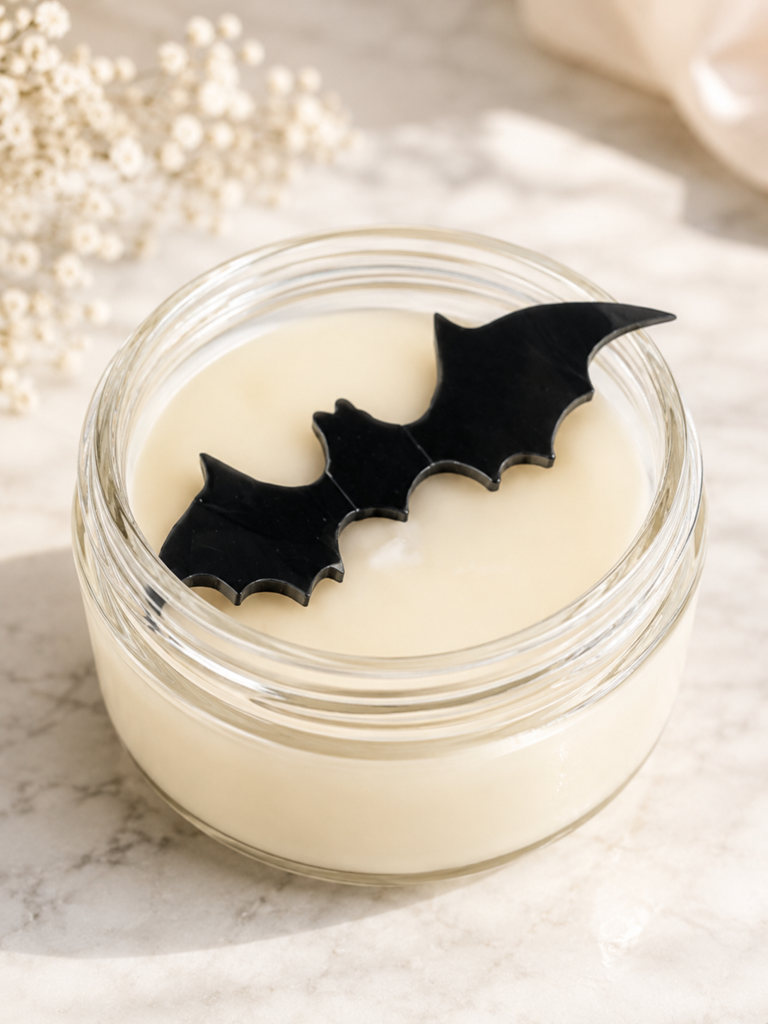 Candle with Bat Decor