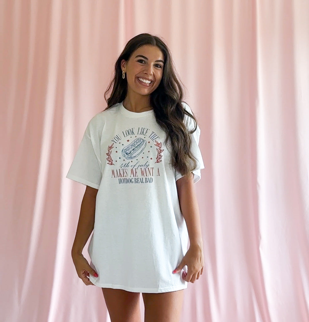 Patriotic Humor Shirt Funny 4th July Hot Dog Quote Tee BBQ Party Graphic Clothing Independence Day Summer Celebration Wear Movie Reference Design Unisex Soft Material Shirt Fireworks Event Outfit Bold Statement America Pride Tee Casual July