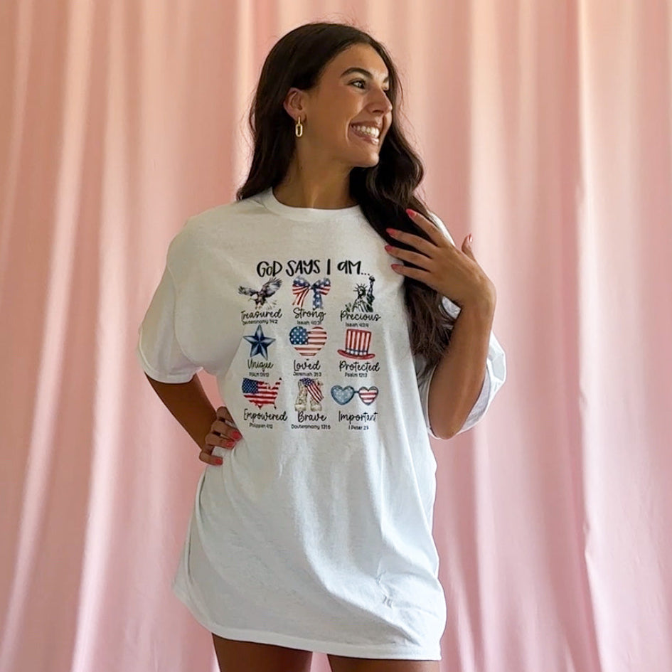 God Says I Am Christian Tee Faith Based Patriotic Shirt Fourth Of July Religious Clothing Inspirational Message Design Red White Blue American Pride Independence Day Church Outfit Unisex Comfortable Graphic Tee Christian Celebration Wear