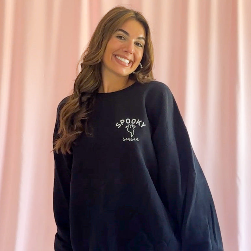 Ghost Design Sweatshirt Halloween Black Cozy Hauntingly Adorable Graphic Spooky Season Fashion Perfect Party Outfit Casual Comfortable Soft Fabric Trick Or Treat Essential Oversized Relaxed Fit Warm Autumn Wear Seasonal Celebration Style
