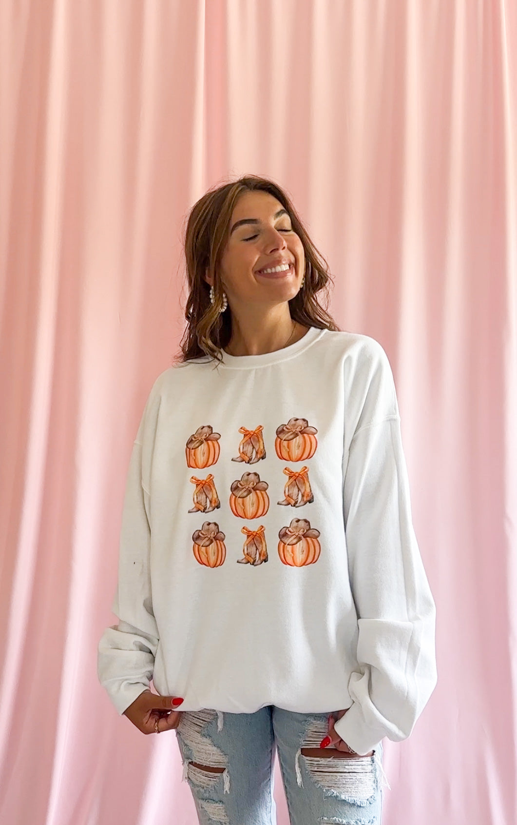 Western Pumpkin Design Fall Sweatshirt Cozy Autumn Gift Idea Comfortable Seasonal Fashion Cowboy Hat Theme Warm Fabric Construction Cowgirl Boot Accent Orange Bow Detail Perfect Fall Celebration Wear Casual Western Style Statement Cute