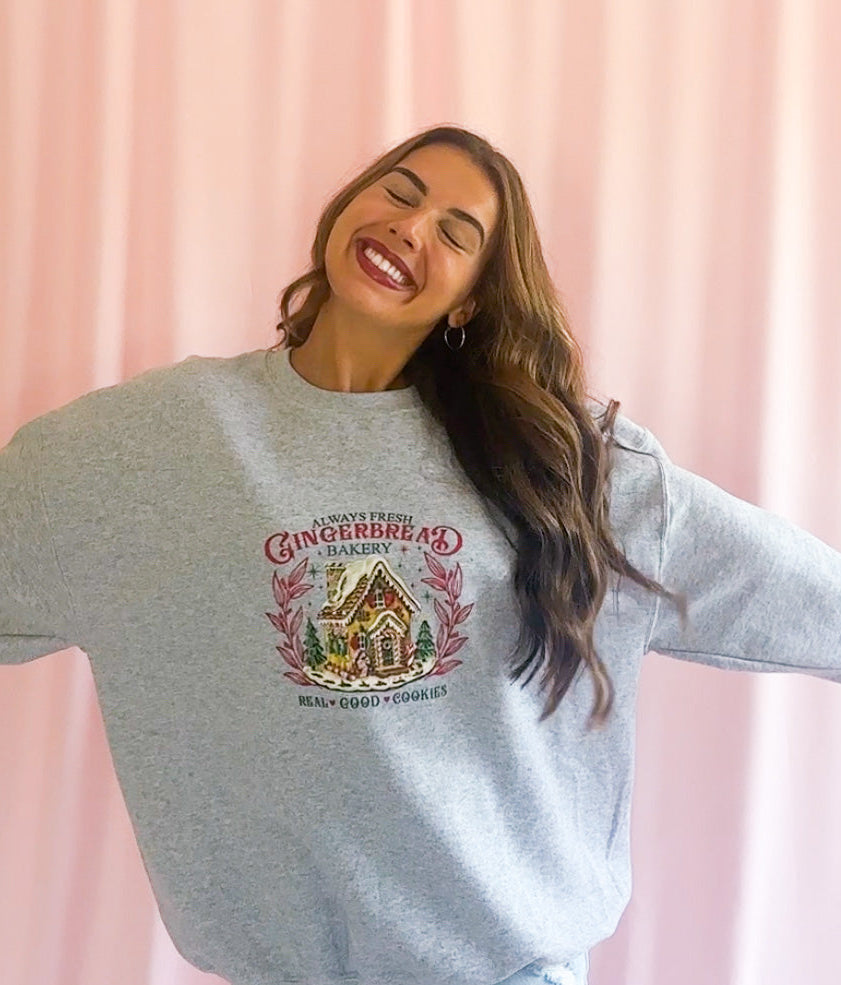 Cozy Christmas Sweatshirt Festive Holiday Pullover Gingerbread House Design Soft Comfortable Fabric Winter Warmth Essential High Quality Holiday Wear Durable Construction Casual Festive Style Perfect Christmas Gift Winter Celebration Outfit