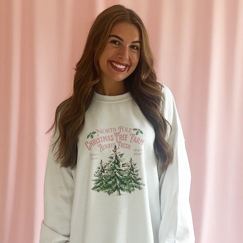 Coquette Christmas Style Pink Bow Sweatshirt Girly Holiday Fashion Statement Cozy Festive Wear Winter Party Outfit Essential Feminine Christmas Attire Comfortable Seasonal Clothing Pink Fashion Collection Holiday Gathering Perfect Gift